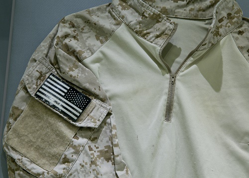 Shirt worn by U.S. Navy Seal Team Six member. Collection 9/11 Memorial Museum, photo by Jin Lee.