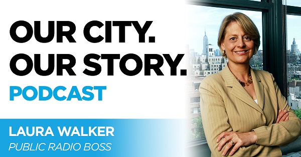 Public Radio president and CEO Laura Walker smiles for a portrait at a window with the Manhattan skyline behind her.