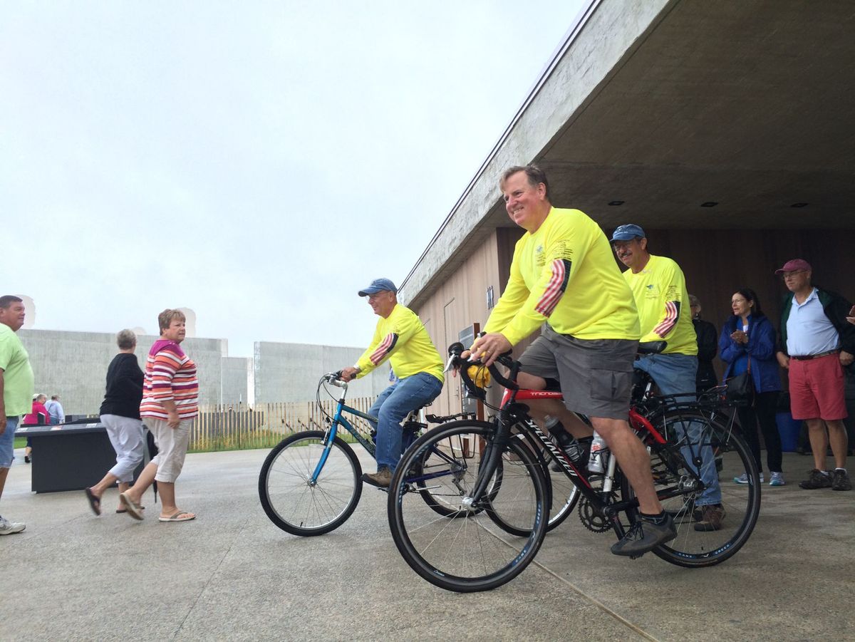 David Brickley, president of the September 11th National Memorial Trail Alliance, leaves the Flight 93 Memorial Visitor Center with the group’s vice president, Andy Hamilton, and the group’s board member, Ben Swecker. 