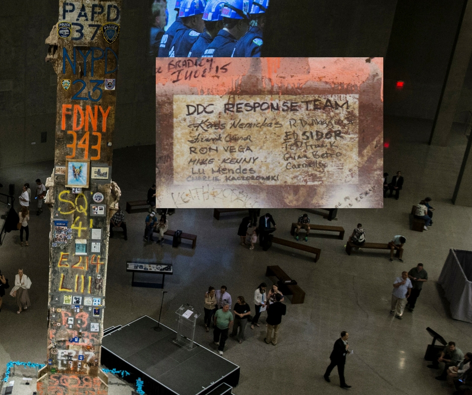 An image of the Last Column zooms on signatures written by members of the New York City Department of Design and Construction. The words “DDC Response Team” are above about a dozen signatures written on the column’s steel.