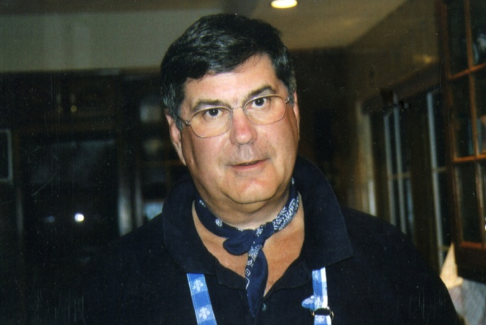 Charles Zion smiles in this family photo. One of his signature bandanas is seen wrapped around his neck.