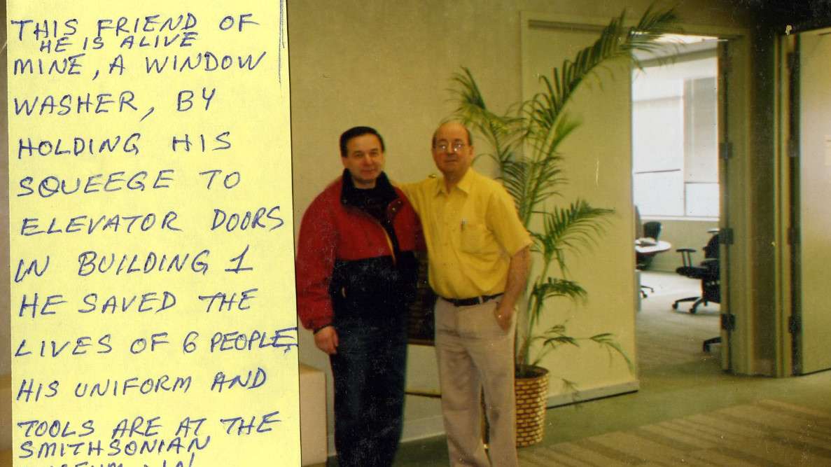 photo of Jan Demczur and a friend from Feb 2010, with a post it attached that briefly describes Jan's escape story.