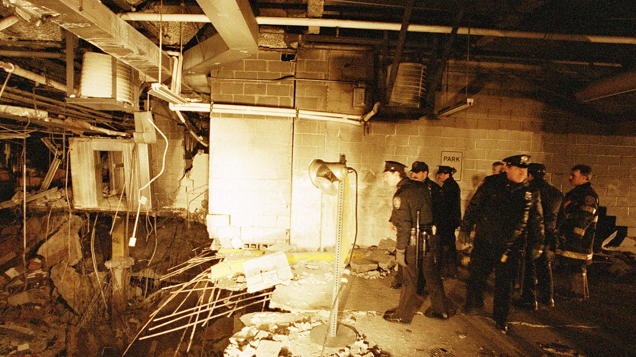 Law enforcement officers inspect the bomb crater after the 1993 World Trade Center attack.