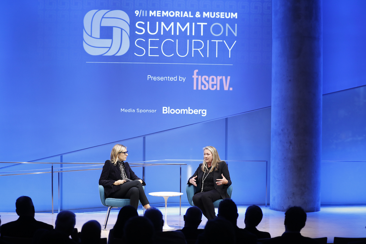 Caryn Seidman-Becker (left) and Vice Admiral Jan E. Tighe on stage at the Museum
