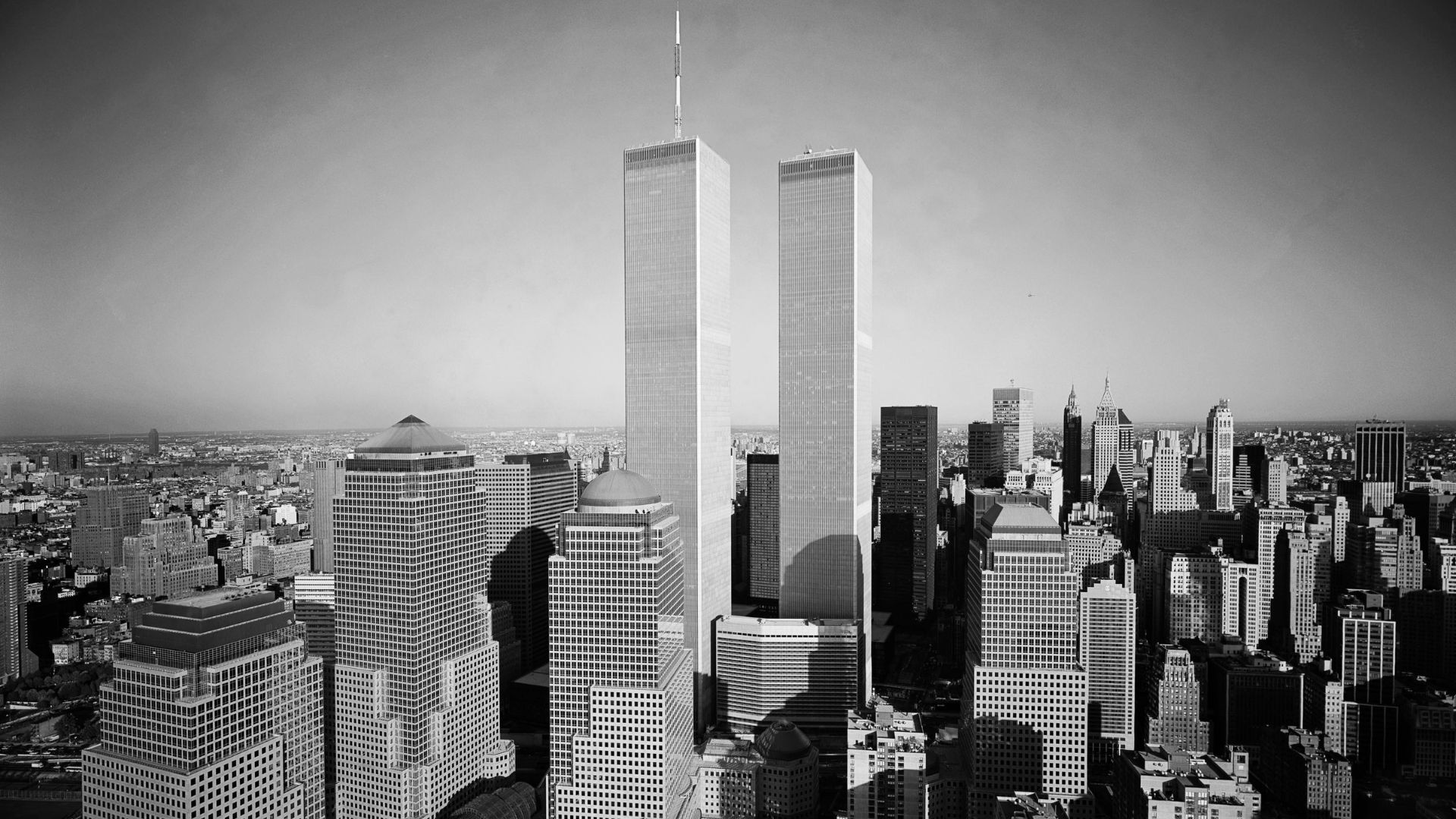 black and white image of the NYC skyline with a focus on the twin towers