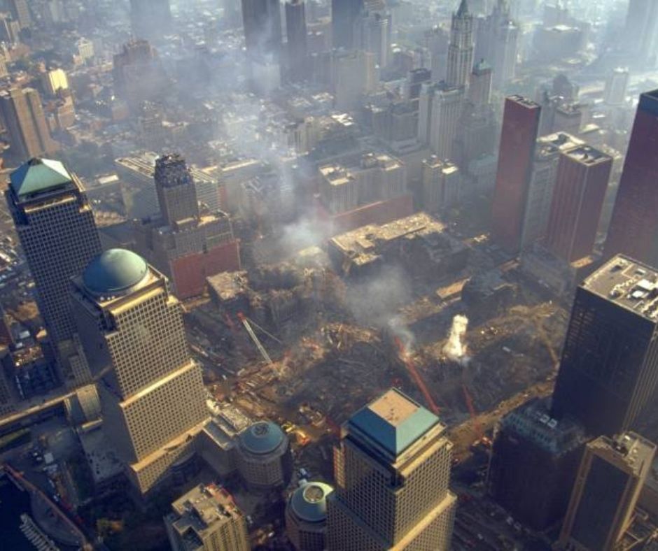 The lower Manhattan skyline, with smoke from the fire filling the air