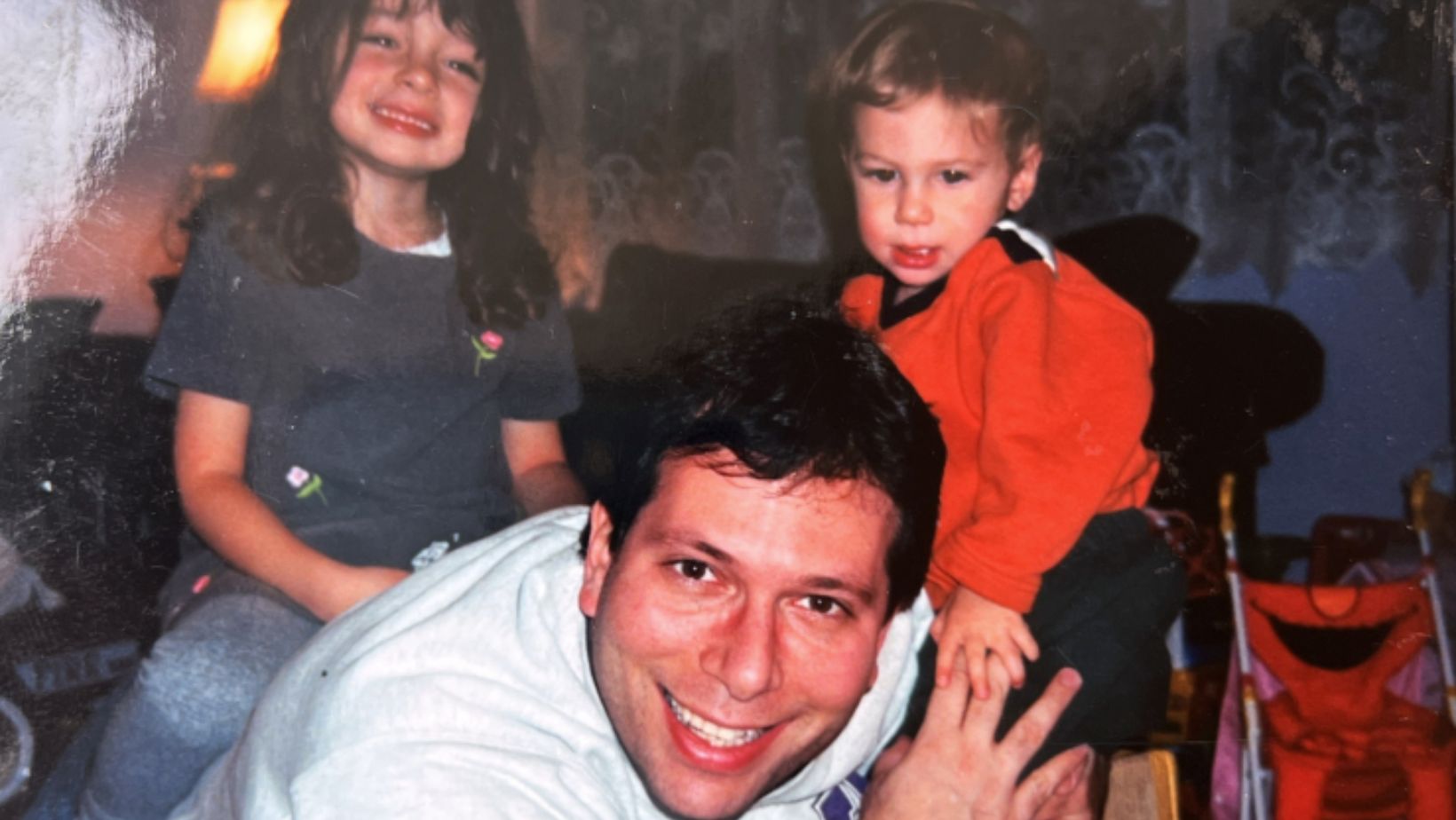 Mark Brisman with his two small children