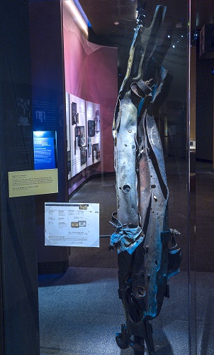 A twisted hunk of metal from a truck is displayed in the Museum.