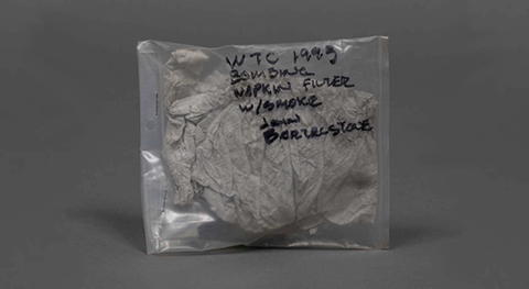 Image of a clear plastic bag containing a damaged collection item from 2/26/93