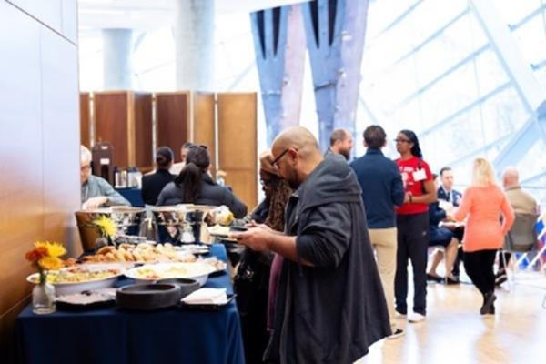 Veteran service organizations gather in the Museum Atrium for a Thank You Breakfast. 