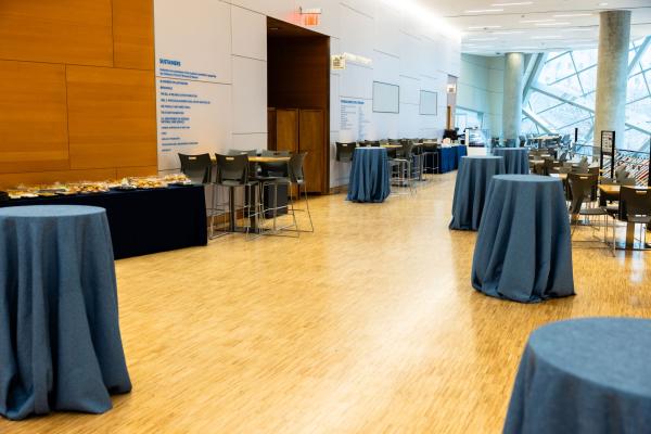 Tall tables set with blue cloths