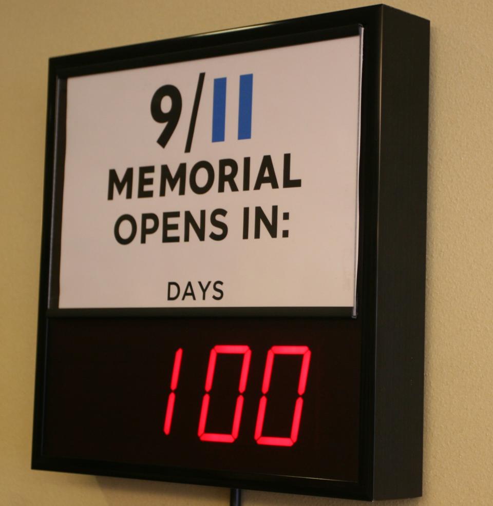 A countdown clock in the offices of the 9/11 Memorial tracks the days until the September opening. (Staff photo) 100CountdownClock2.jpg