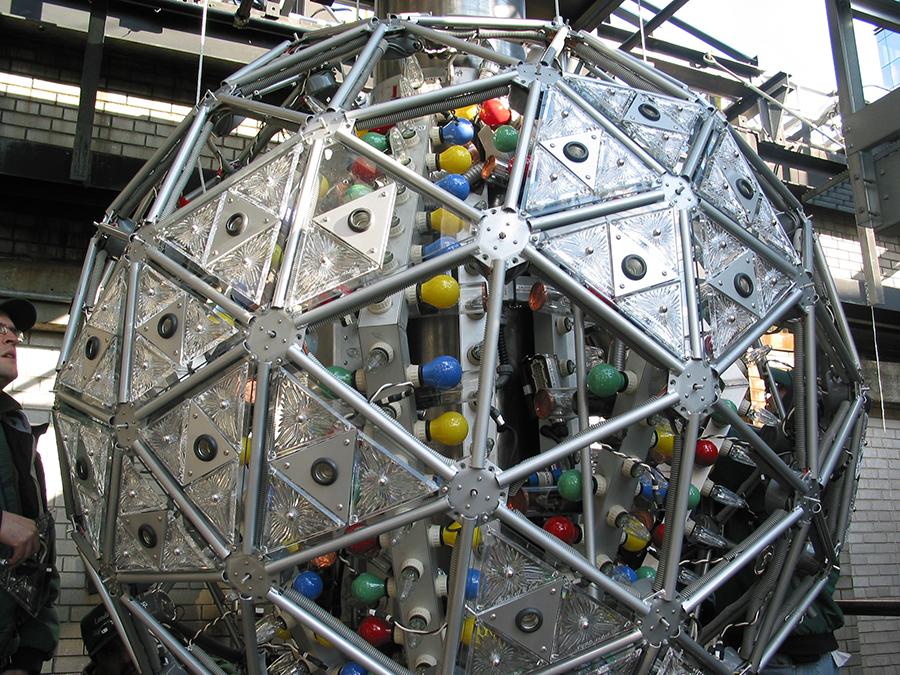 A close-up shows the details of the Times Square New Year’s ball in this photo from 2001. Among the details are Waterford crystals and red, blue, green, and yellow lights.