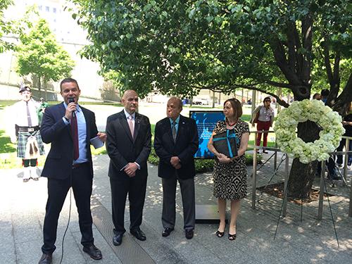 9/11 Memorial President Joe Daniels, FDNY Commissioner Sal Cassano, former firefighter Sal Cassano, and 9/11 Memorial Museum Director Alice Greenwald take part in a wreath laying next to the Survivor Tree on Memorial plaza. 