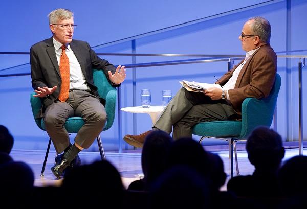 Stephen Sestanovich gestures as he speaks onstage with Clifford Chanin, executive vice president and deputy director for museum programs, during a public program at the Museum auditorium.